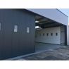 Porte sectionnelle industrielle coulissante LIBERTE Largeur 14000mmx Hauteur 4000mm